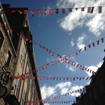 blue skies celebrating the Edinburgh book festival and Fringe with bunting